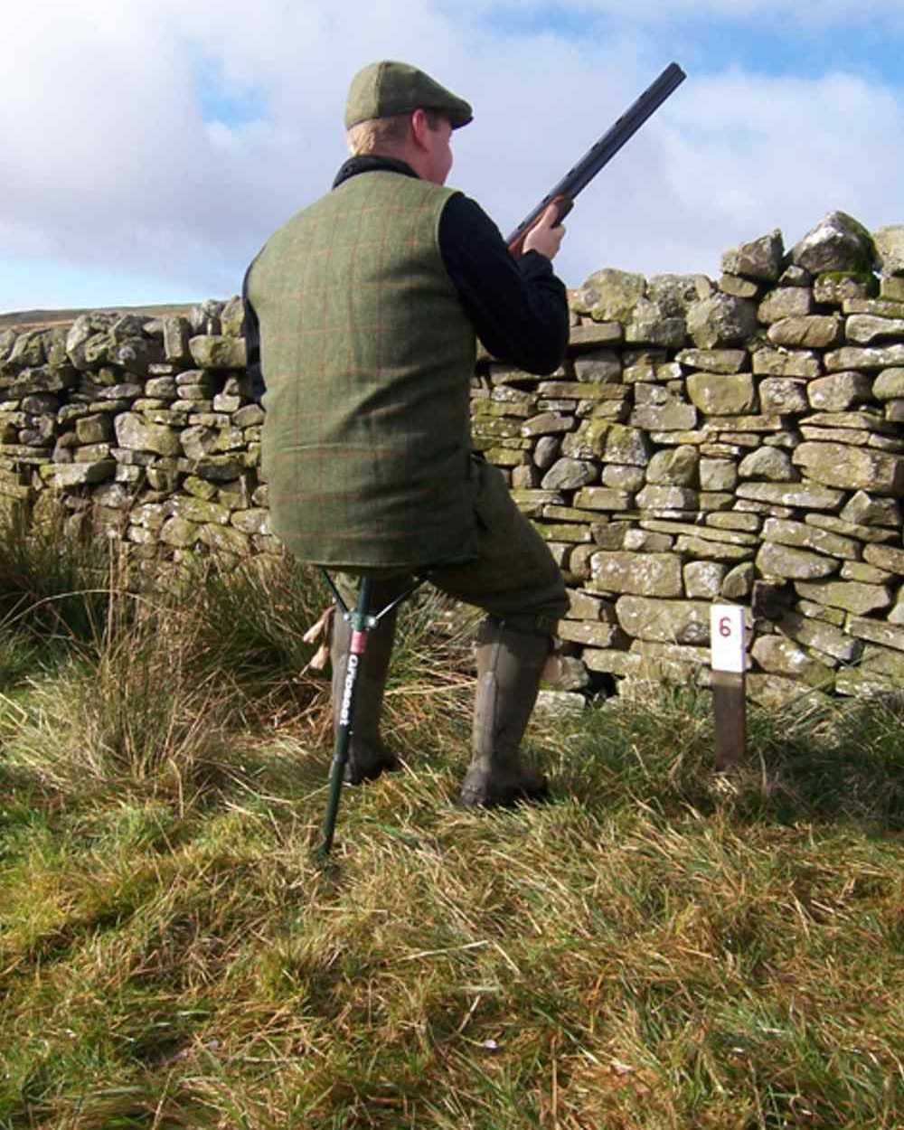 Bisley Gripseat Cartridge Collector Seat Stick On Wall Background