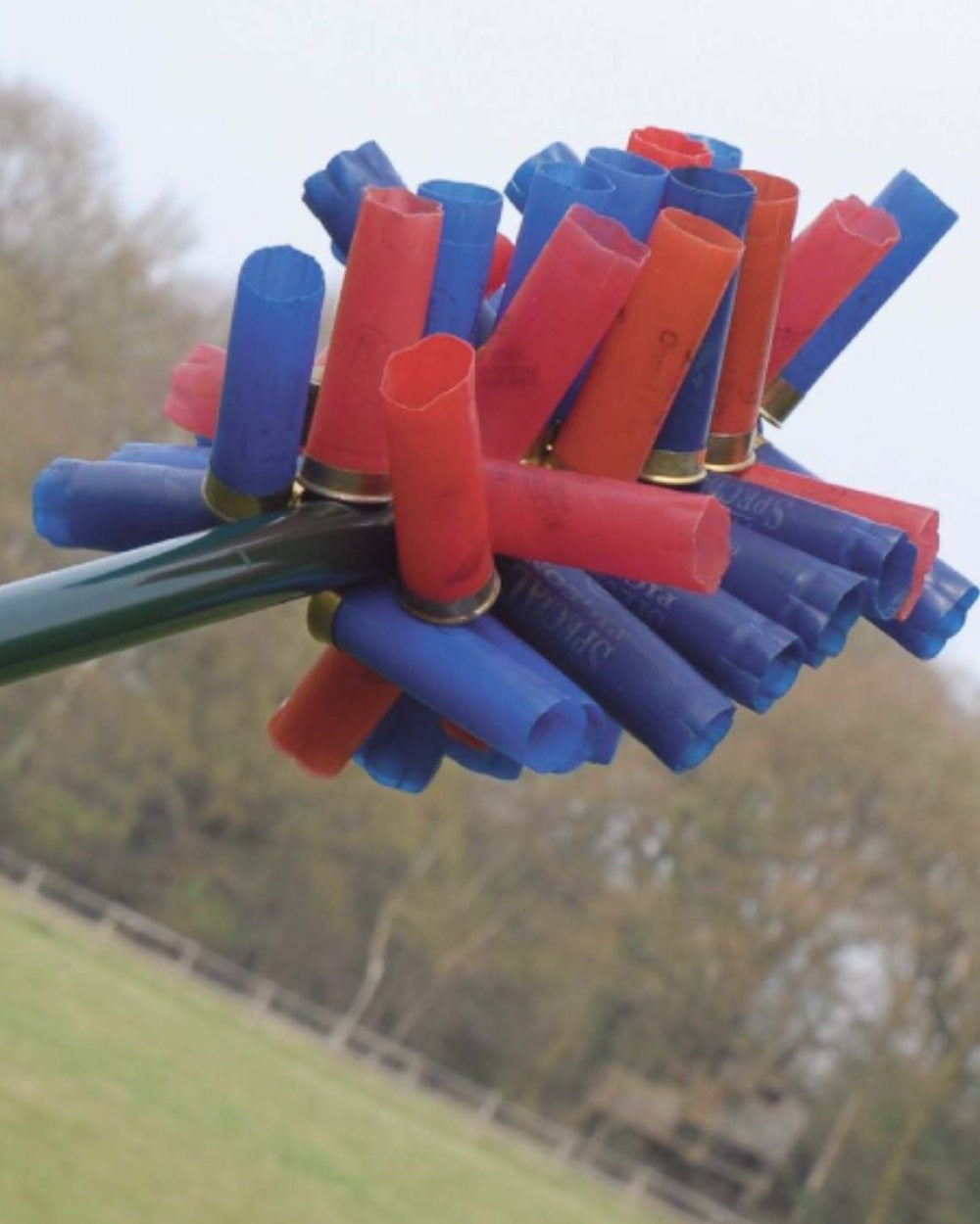Bisley Gripstick Shotgun Cartridge Collector On Forest Background