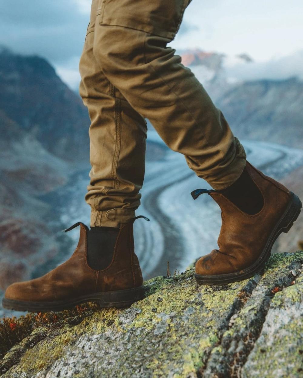 Antique Brown coloured Blundstone 1477 Antique Brown Waterproof Boots on mountain background #colour_antique-brown