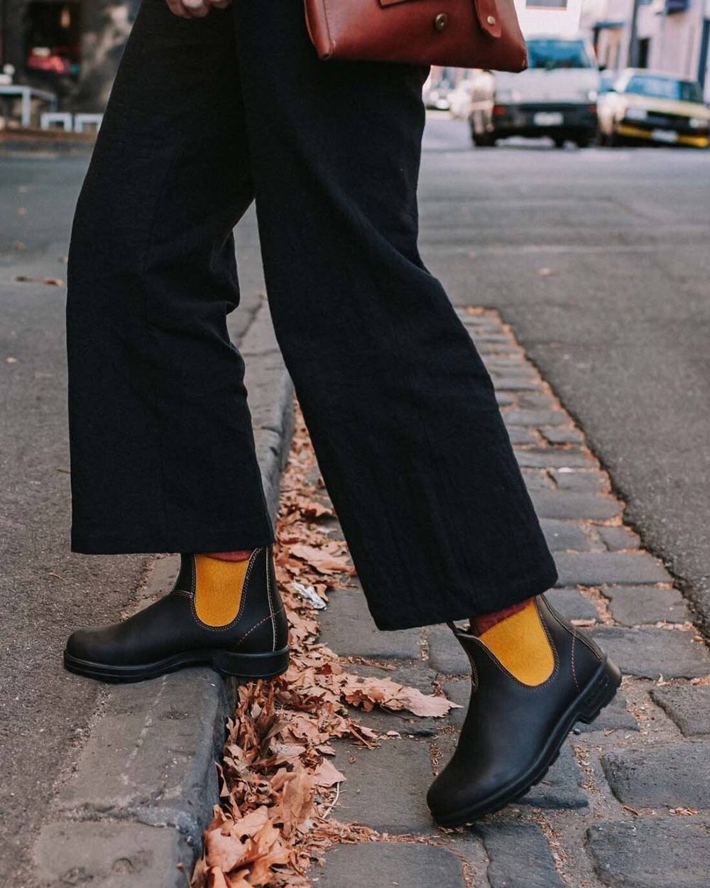 Dark Brown Mustard coloured Blundstone 1919 Dark Brown Mustard Leather Boots on street background #colour_dark-brown-mustard