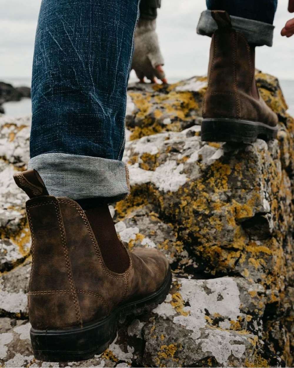 Rustic Brown coloured Blundstone Classic 585 Chelsea Boots on rock background #colour_rustic-brown