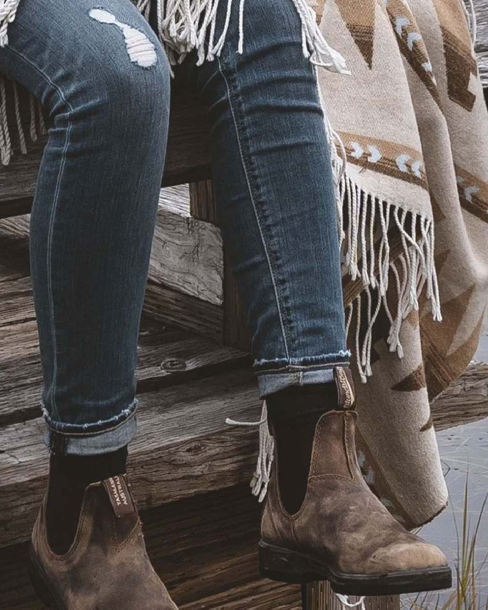 Rustic Brown coloured Blundstone Classic 585 Chelsea Boots on lake background #colour_rustic-brown