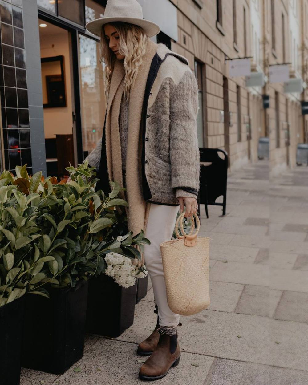 Antique Brown coloured Blundstone Womens 1673 Chelsea Boots on street background #colour_antique-brown
