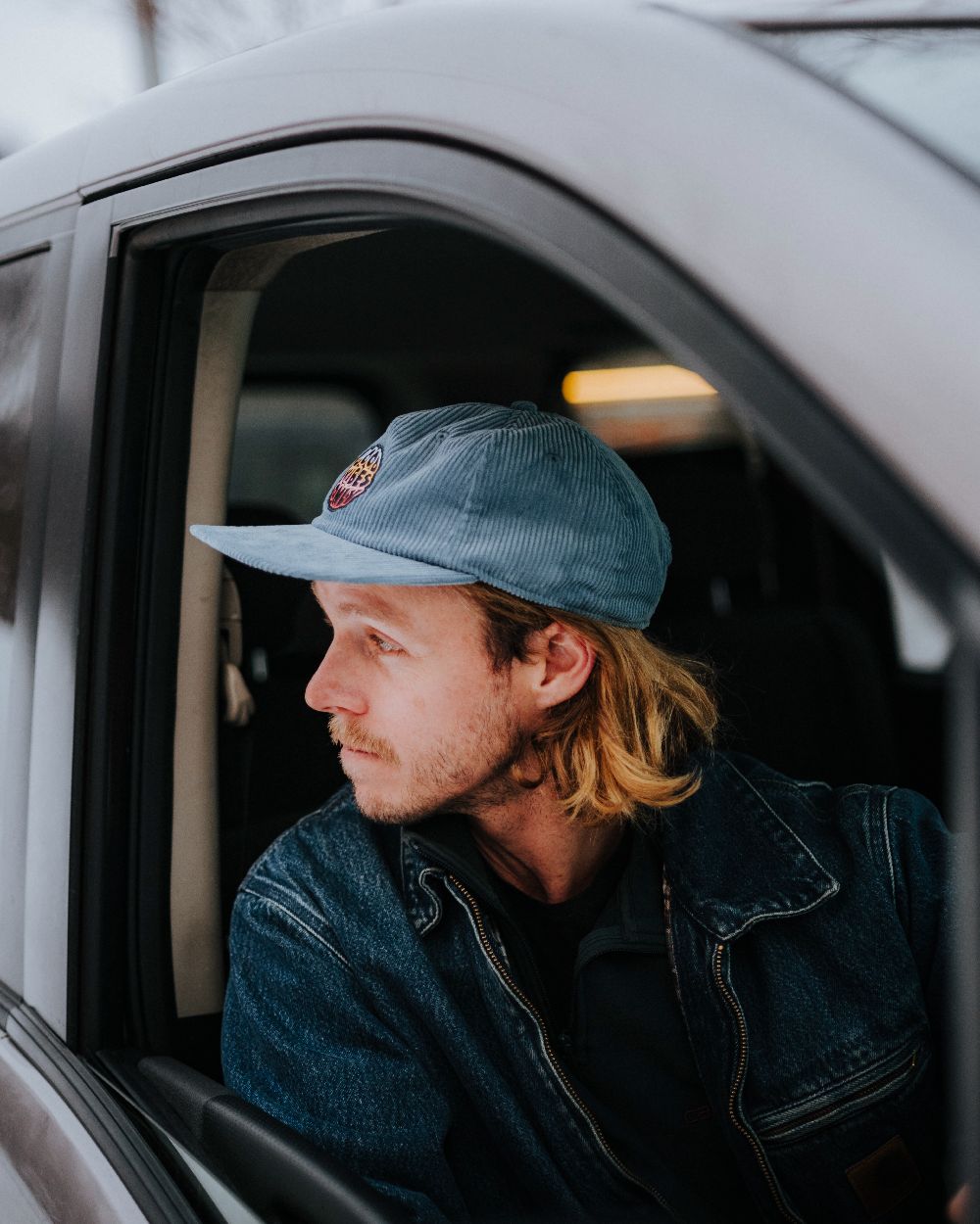 Water Coloured Buff Dister Chill Trucker Cap on car background #colour_water