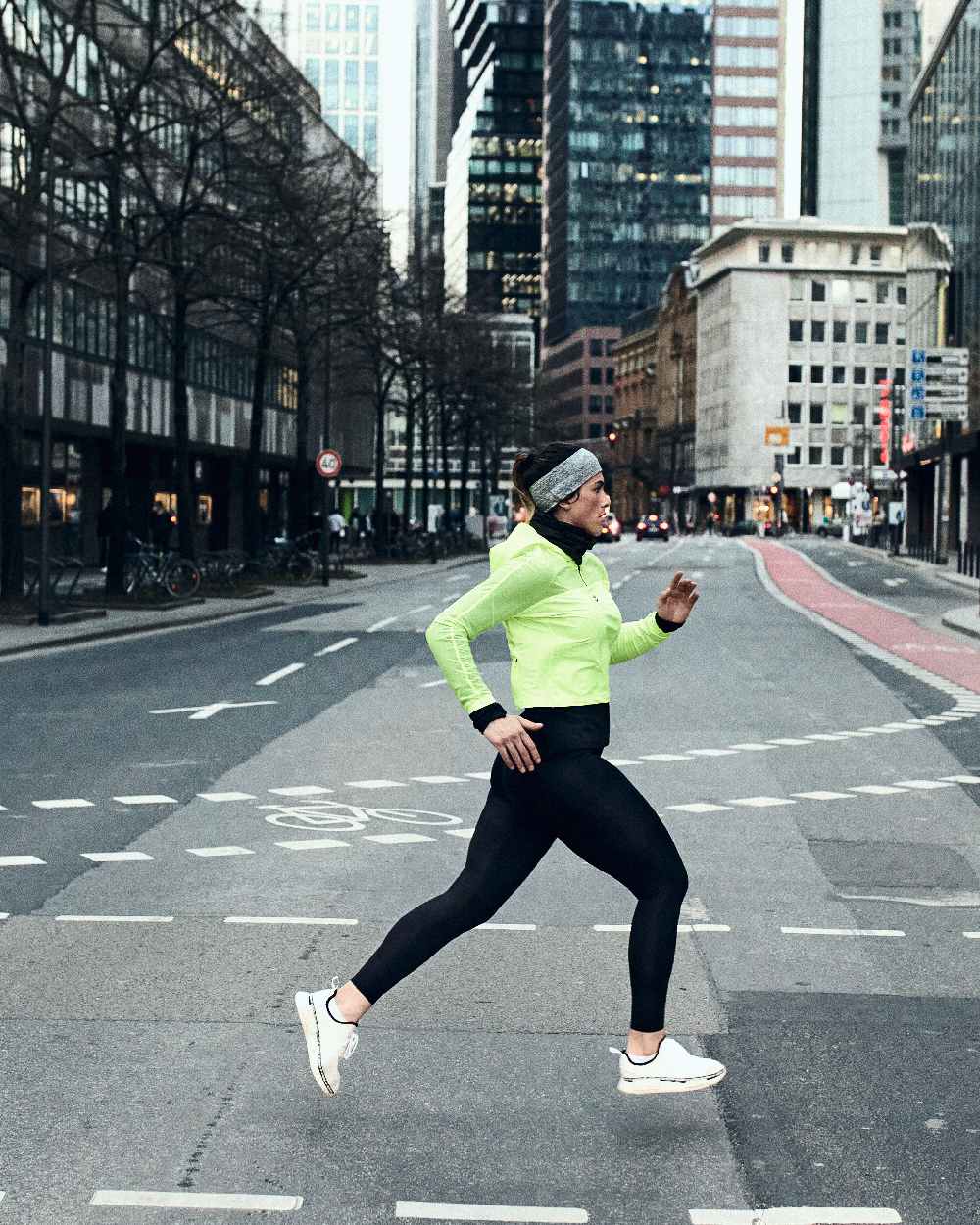 Light Grey Coloured Buff DryFlx Headband on street background #colour_light-grey