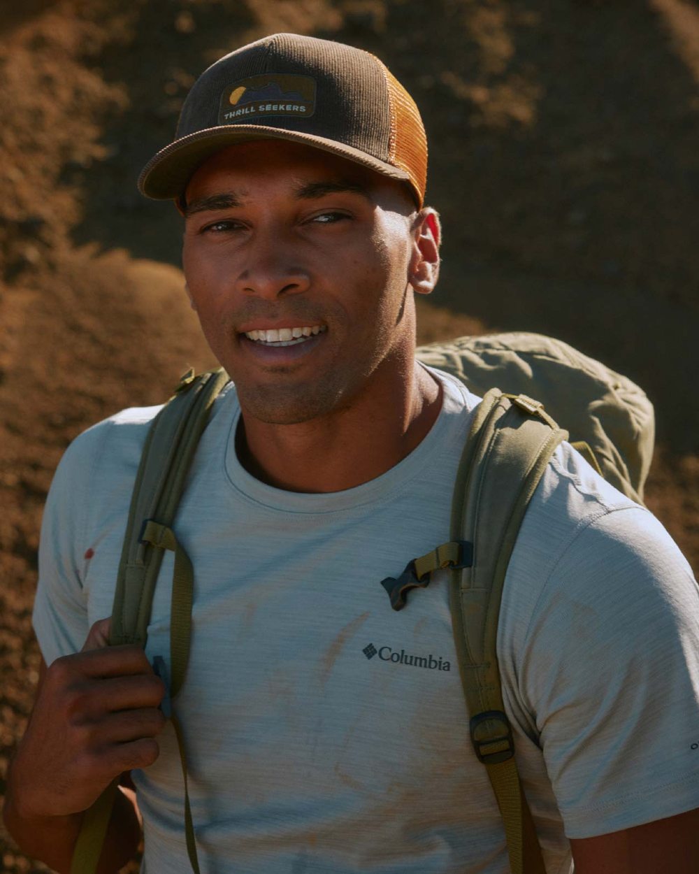 Brown Coloured Buff Explore Trucker Cap on ground background #colour_brown