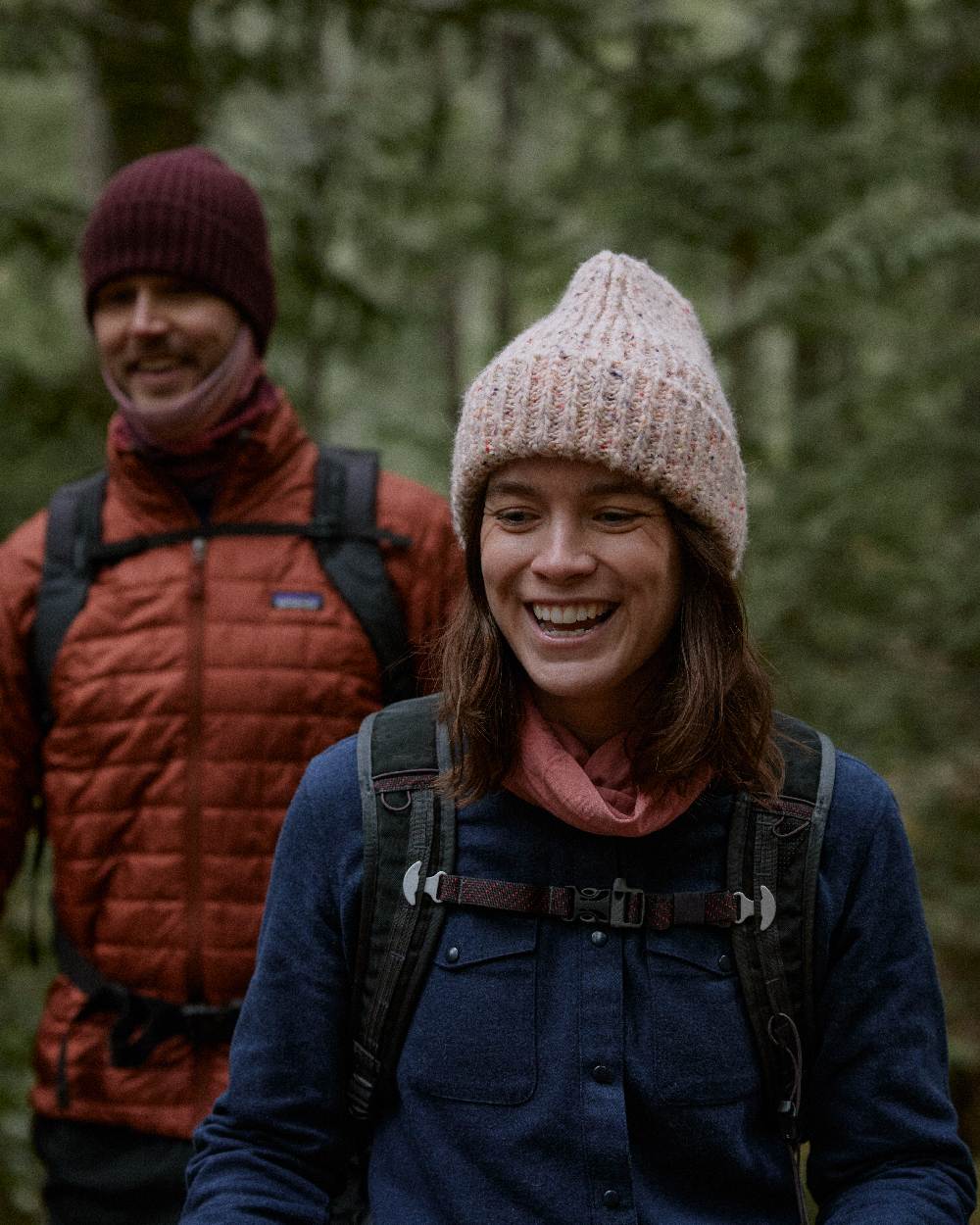 White Coloured Buff Kim Knitted Fleece Beanie on forest background #colour_white