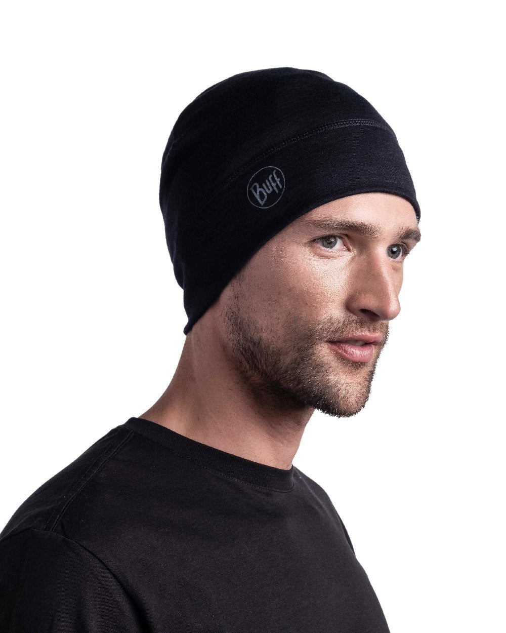 Black Coloured Buff Merino Lightweight Beanie on white background #colour_black
