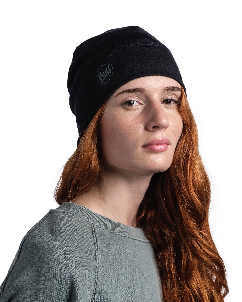 Black Coloured Buff Merino Lightweight Beanie on white background #colour_black