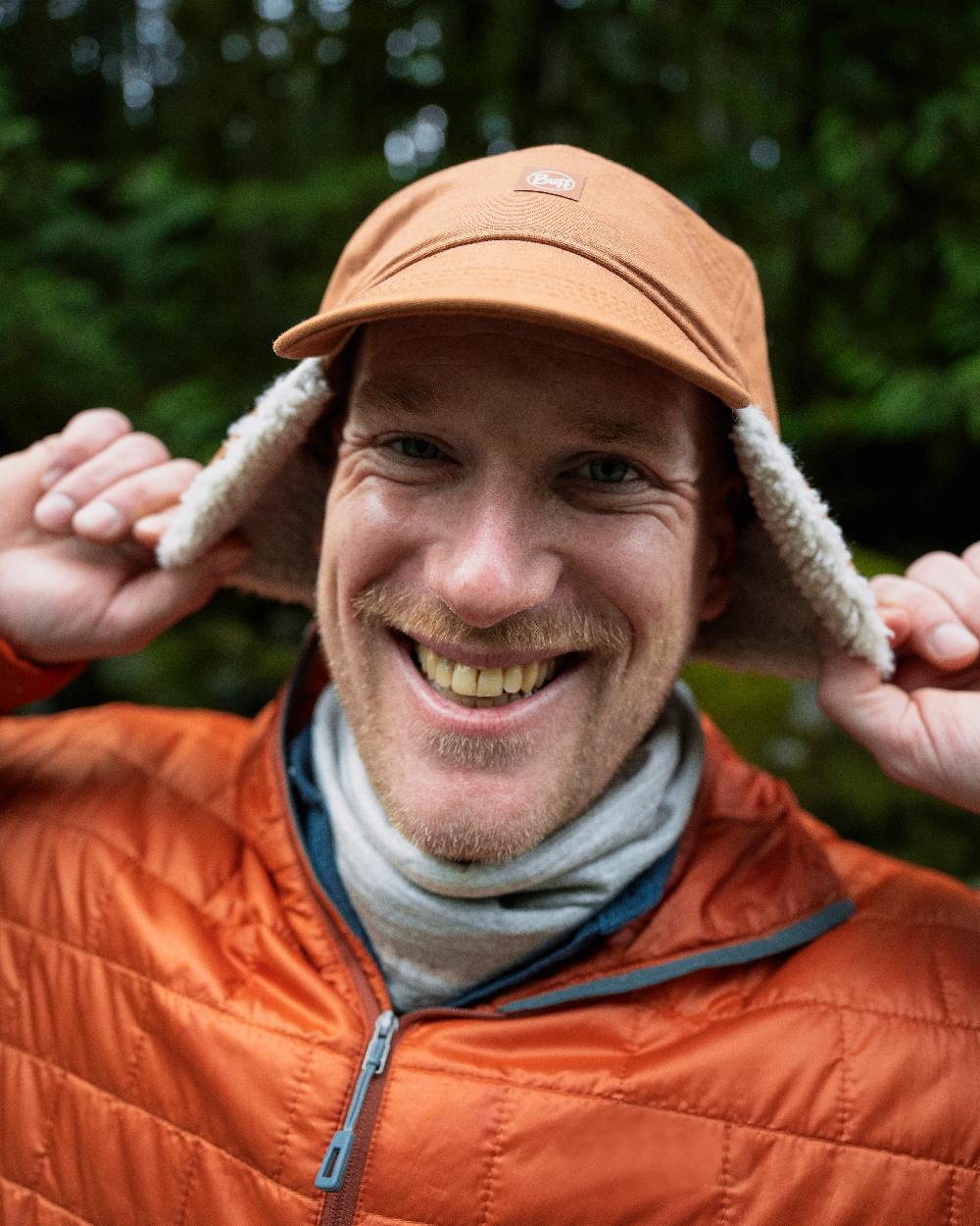 Copper Coloured Buff Simu Fall Line Cap on forest background #colour_copper