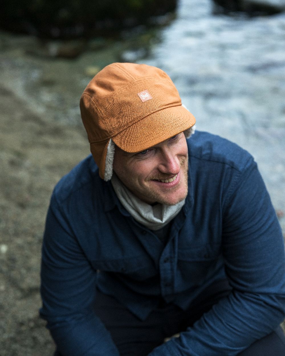 Copper Coloured Buff Simu Fall Line Cap on lake background #colour_copper