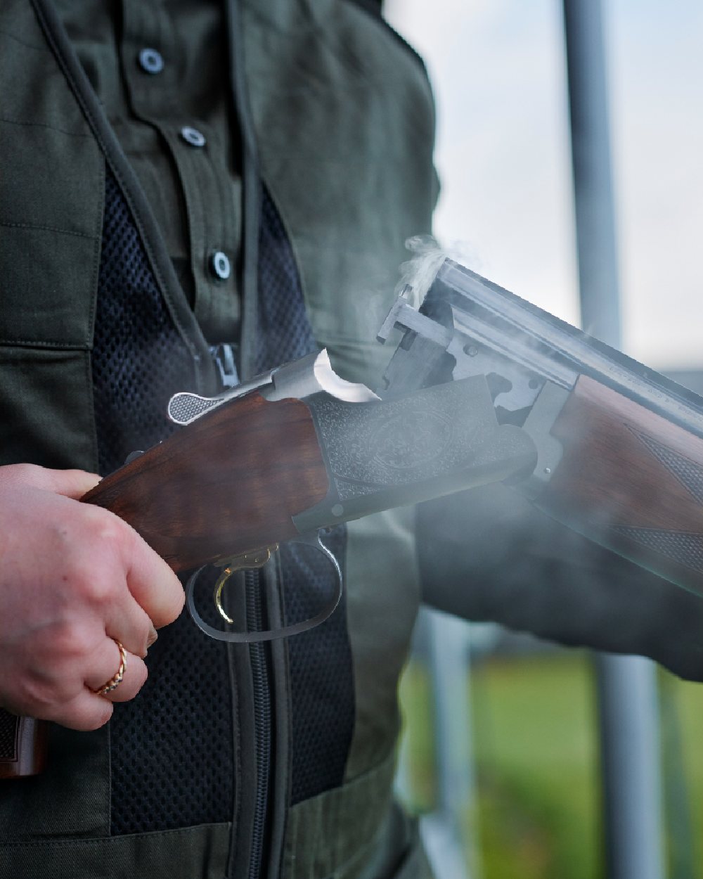 Timber coloured Deerhunter Atlas Mesh Shooting Waistcoat on blurry background #colour_timber
