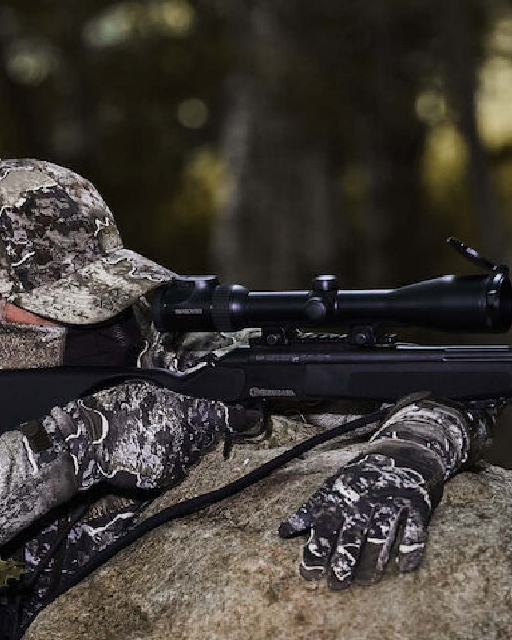 Realtree Excape coloured Deerhunter Excape Gloves with Silicone Grip on forest background #colour_realtree-excape