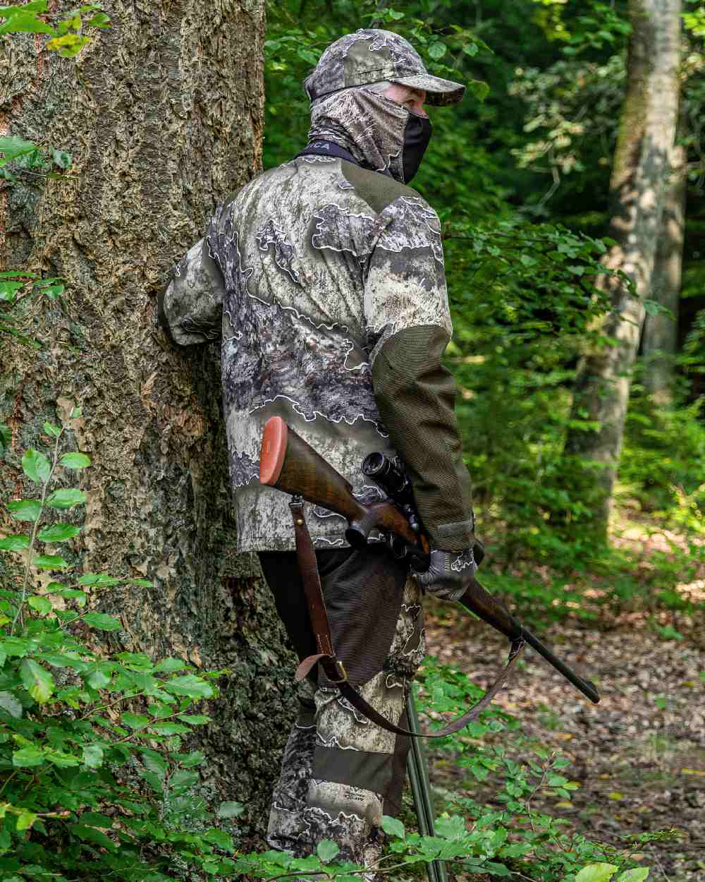 Realtree Excape coloured Deerhunter Excape Light Jacket on forest background #colour_realtree-excape