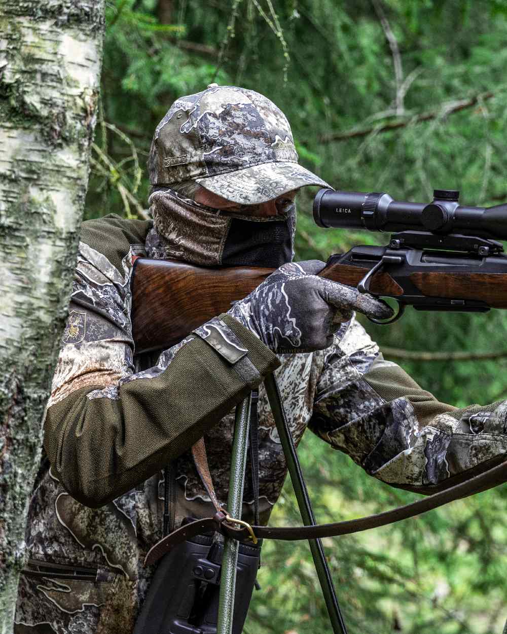 Realtree Excape coloured Deerhunter Excape Light Jacket on forest background #colour_realtree-excape