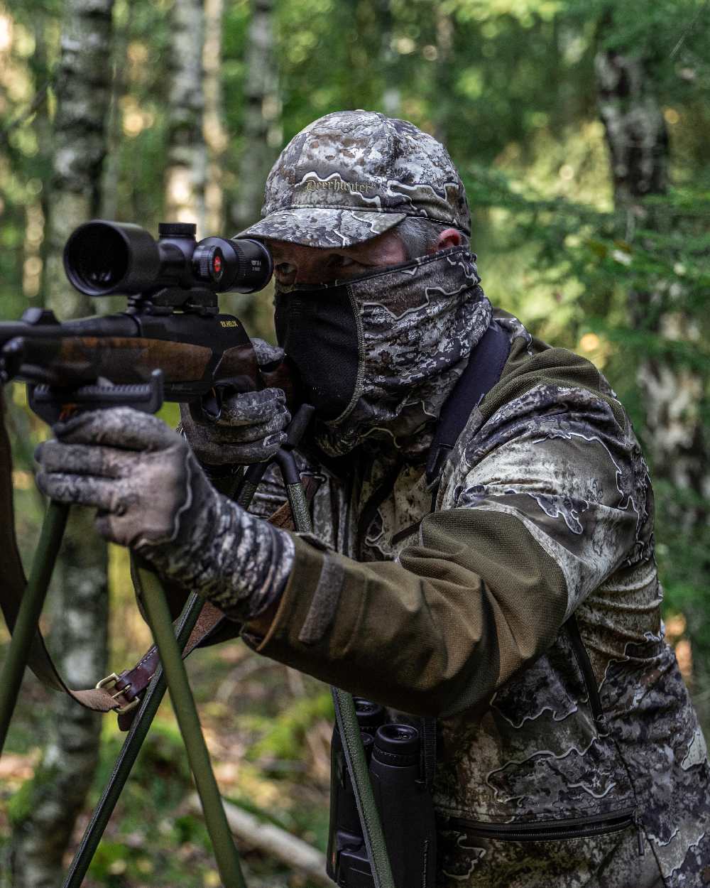 Realtree Excape coloured Deerhunter Excape Light Jacket on forest background #colour_realtree-excape