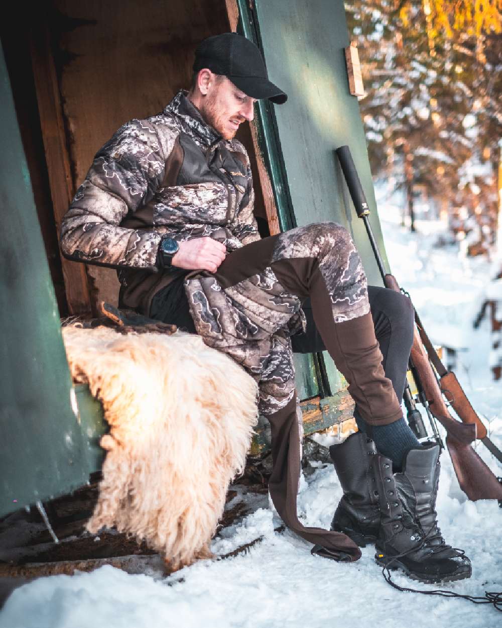 Realtree Excape coloured Deerhunter Excape Quilted Jacket on snow background #colour_realtree-excape