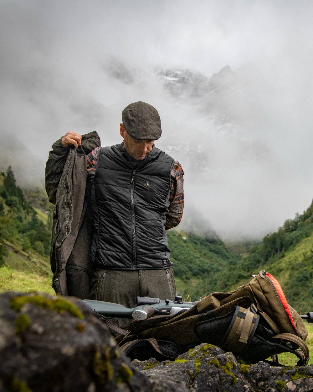 Black Coloured Deerhunter Heat Inner Waistcoat on mountain background #colour_black
