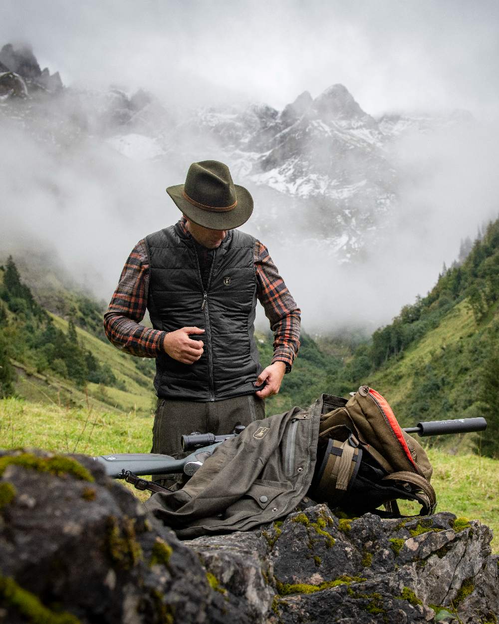 Black Coloured Deerhunter Heat Inner Waistcoat on mountain background #colour_black