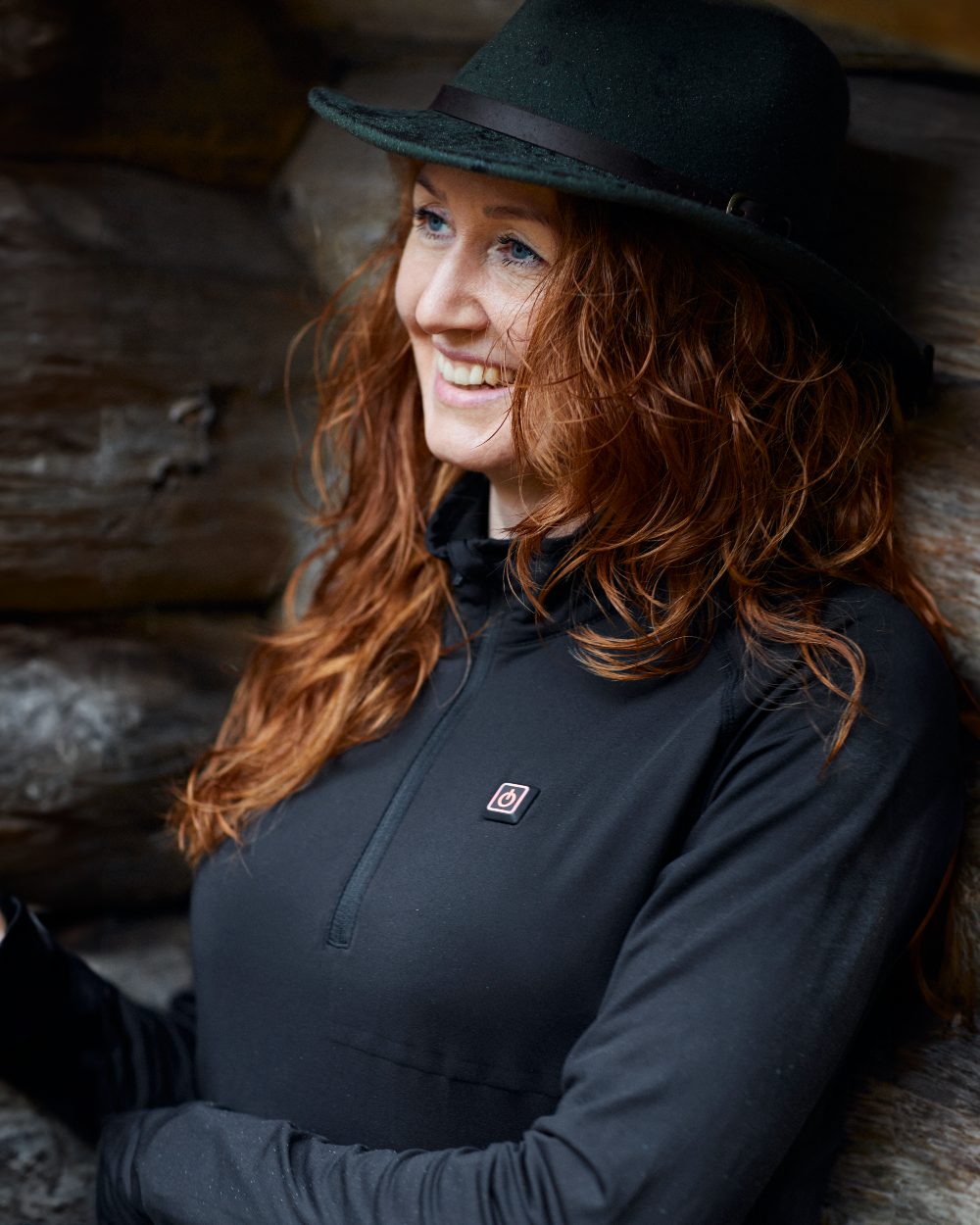 Black coloured Deerhunter Heat Undershirt with Zip Neck on woody background #colour_black