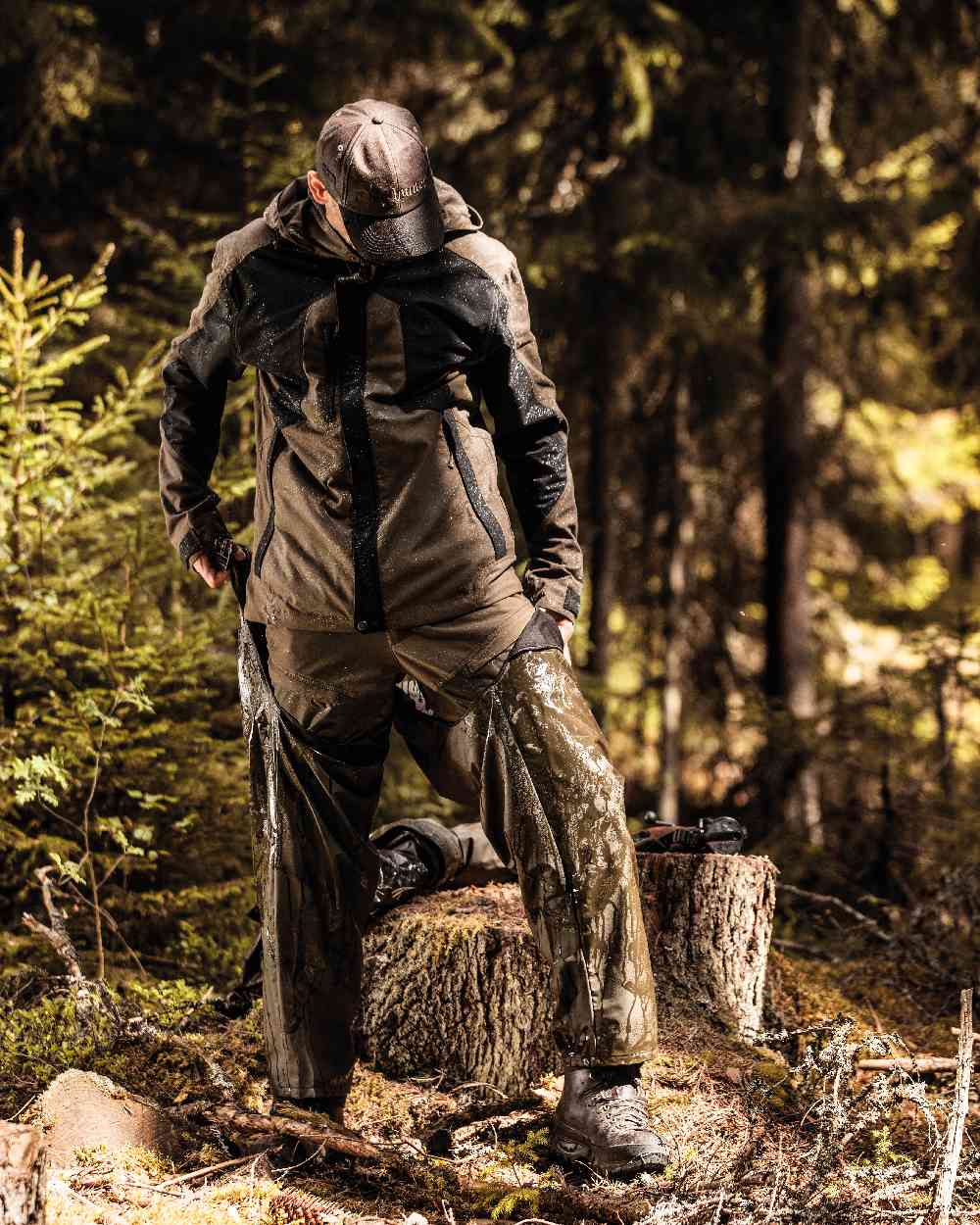 Art Green coloured Deerhunter Hurricane Legging Trousers on forest background #colour_art-green