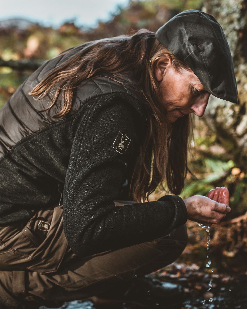 Timber Coloured Deerhunter Lady Caroline Padded Jacket on blurry background #colour_timber