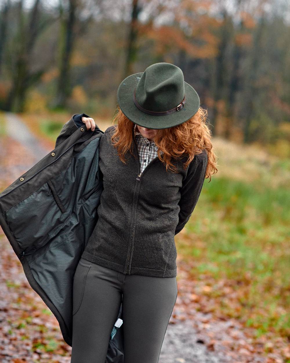 Dark Elm coloured Deerhunter Lady Darlington Full Zip Cardigan on blurry background #colour_dark-elm