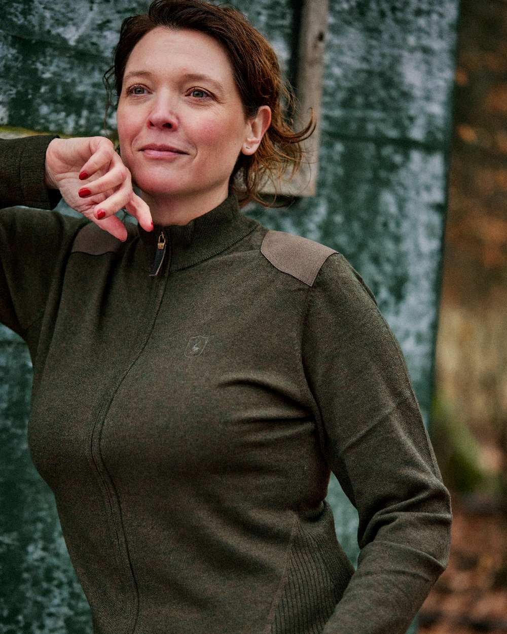 Green Melange coloured Deerhunter Lady Darlington Full Zip Cardigan on blurry background #colour_green-melange