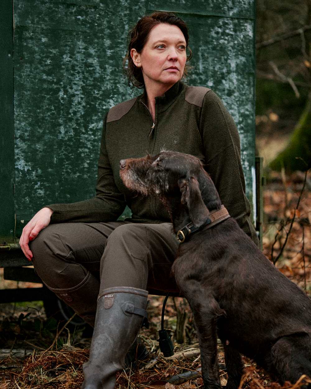 Green Melange coloured Deerhunter Lady Darlington Full Zip Cardigan on forest background #colour_green-melange
