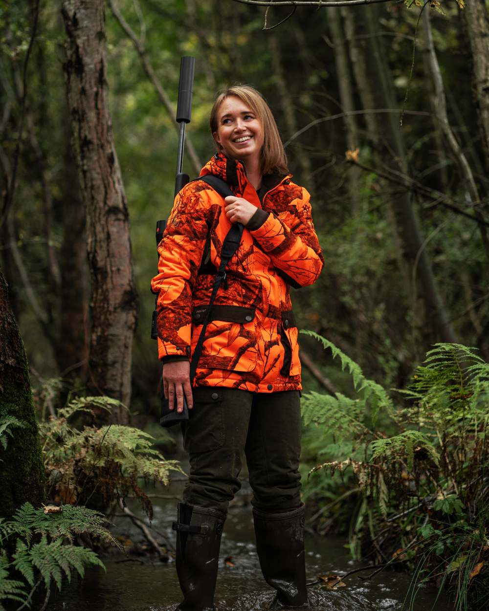 Realtree Edge Orange coloured Deerhunter Lady Eagle Winter Jacket  on forest background #colour_realtree-edge-orange