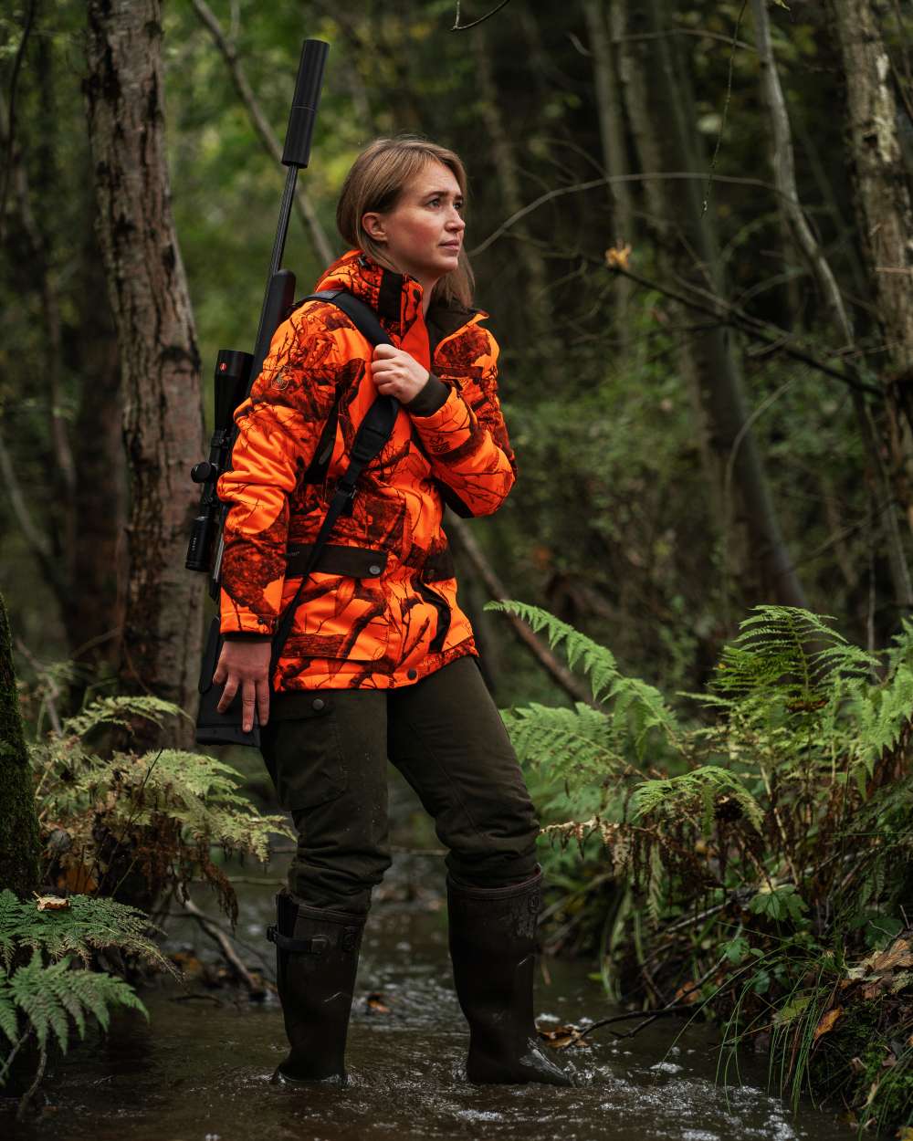 Realtree Edge Orange coloured Deerhunter Lady Eagle Winter Jacket  on forest background #colour_realtree-edge-orange