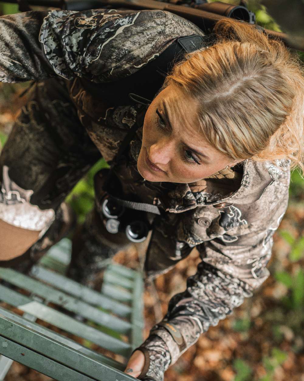 Realtree Excape coloured Deerhunter Lady Excape Softshell Jacket on stairs background #colour_realtree-excape