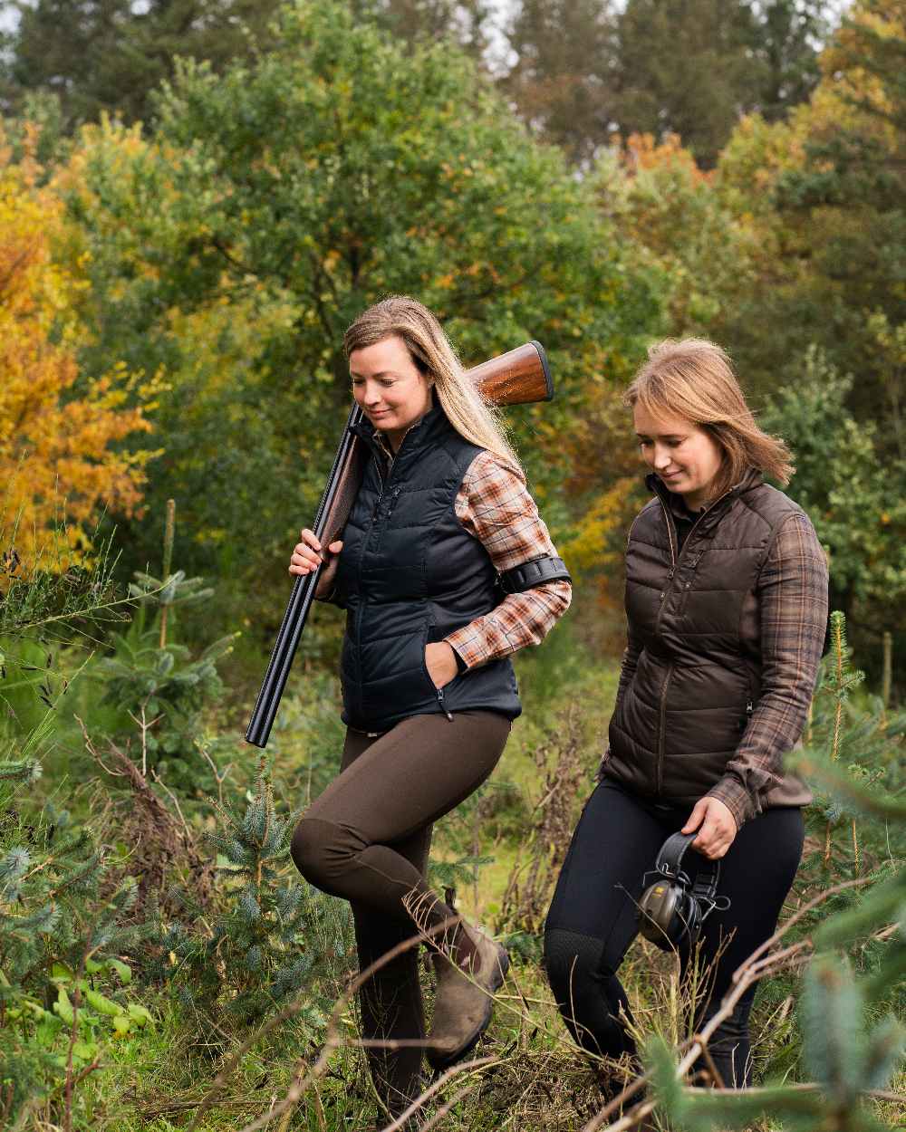 Wood Coloured Deerhunter Lady Heat Padded Waistcoat on forest background #colour_wood