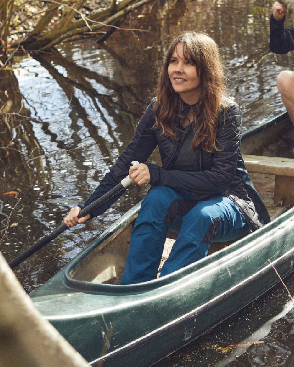 Black coloured Deerhunter Lady Pine Padded Inner Jacket on lake background #colour_black