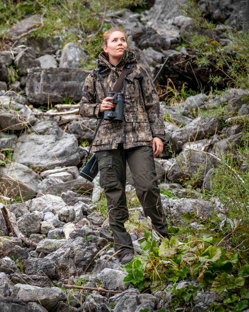 Elmwood coloured Deerhunter Lady Raven Trousers on rock background #colour_elmwood