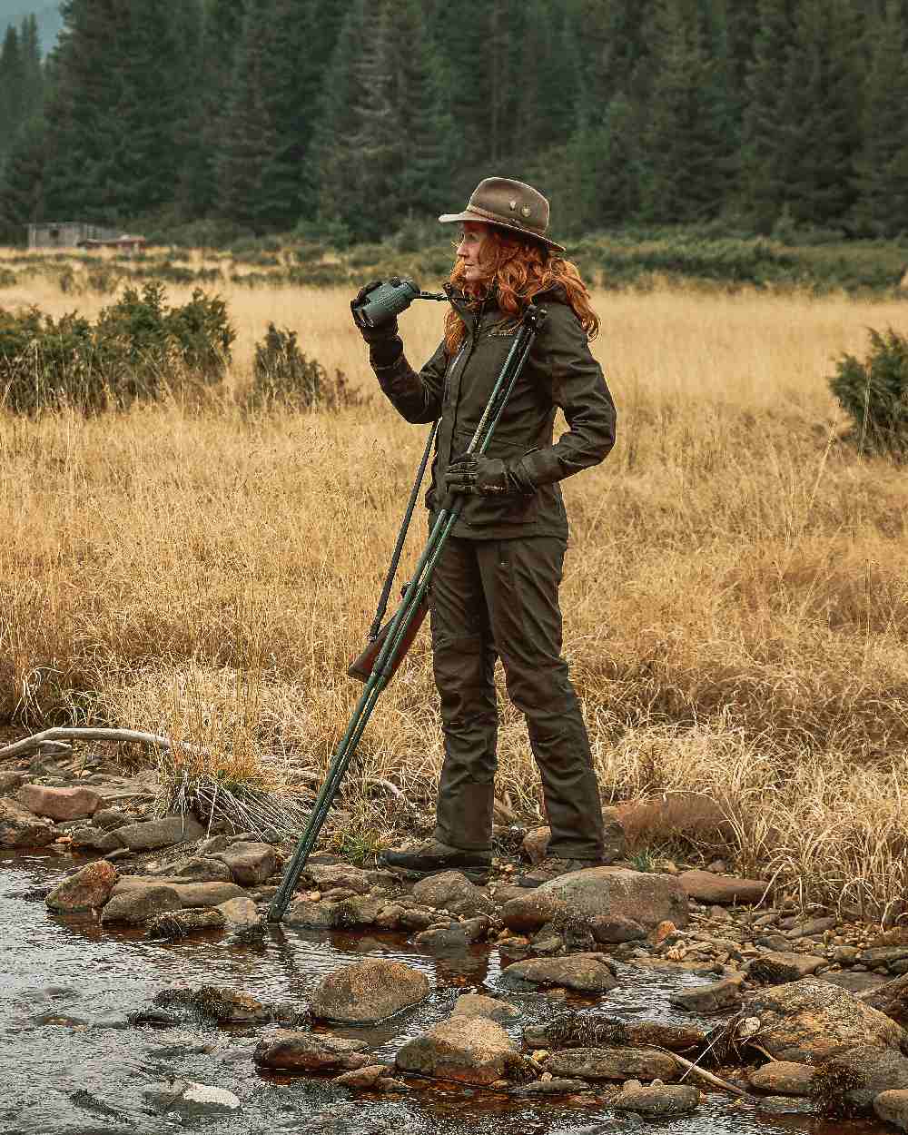 Elmwood coloured Deerhunter Lady Raven Winter Trousers on grassy background #colour_elmwood