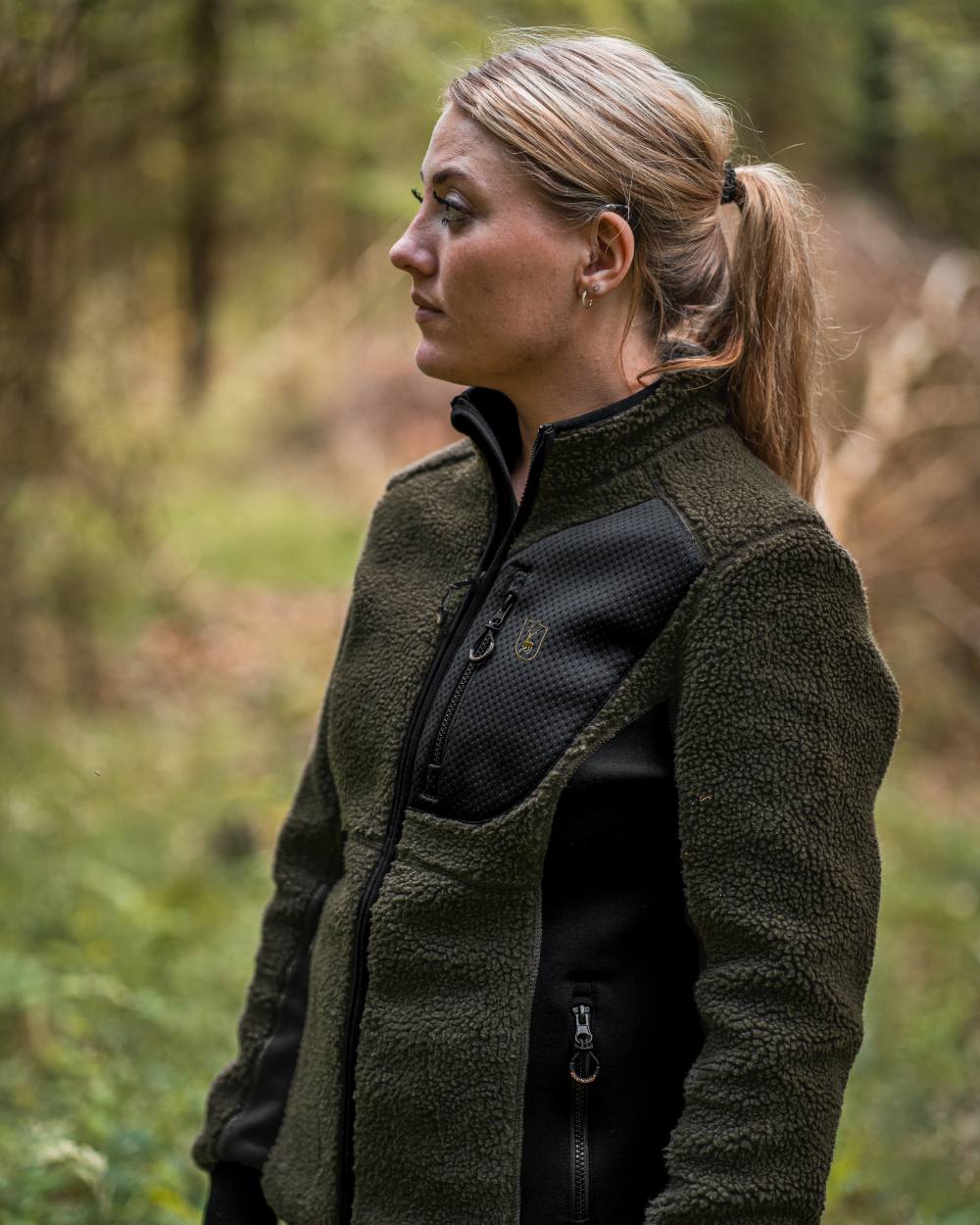 Adventure Green Coloured Deerhunter Lady Roja Fiber Pile Jacket On A Forest Background #colour_adventure-green