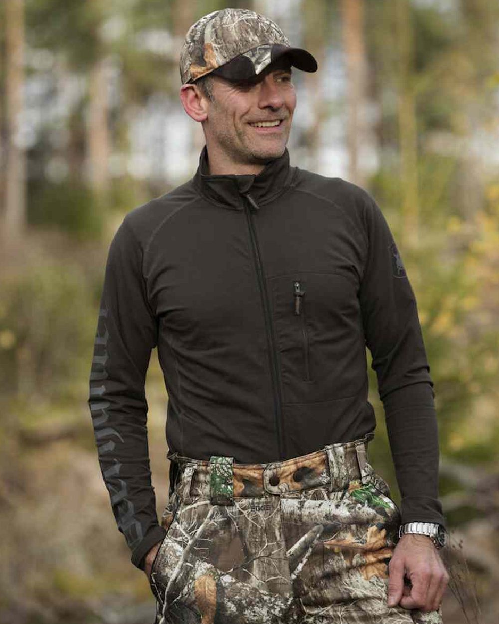 Edge Camo coloured Deerhunter Muflon Cap with Safety on forest background #colour_edge-camo