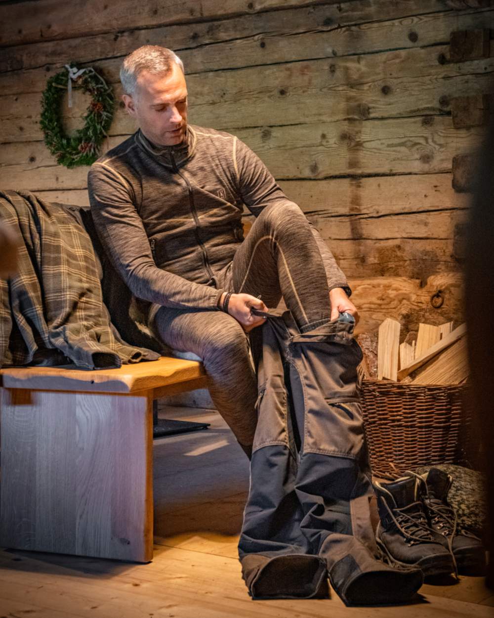 Brown Melange coloured Deerhunter Norden Insulated Long Johns on wooden background #colour_brown-melange