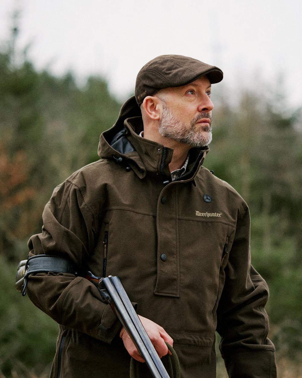 Peat Coloured Deerhunter PRO Gamekeeper Smock on blurry background #colour_peat
