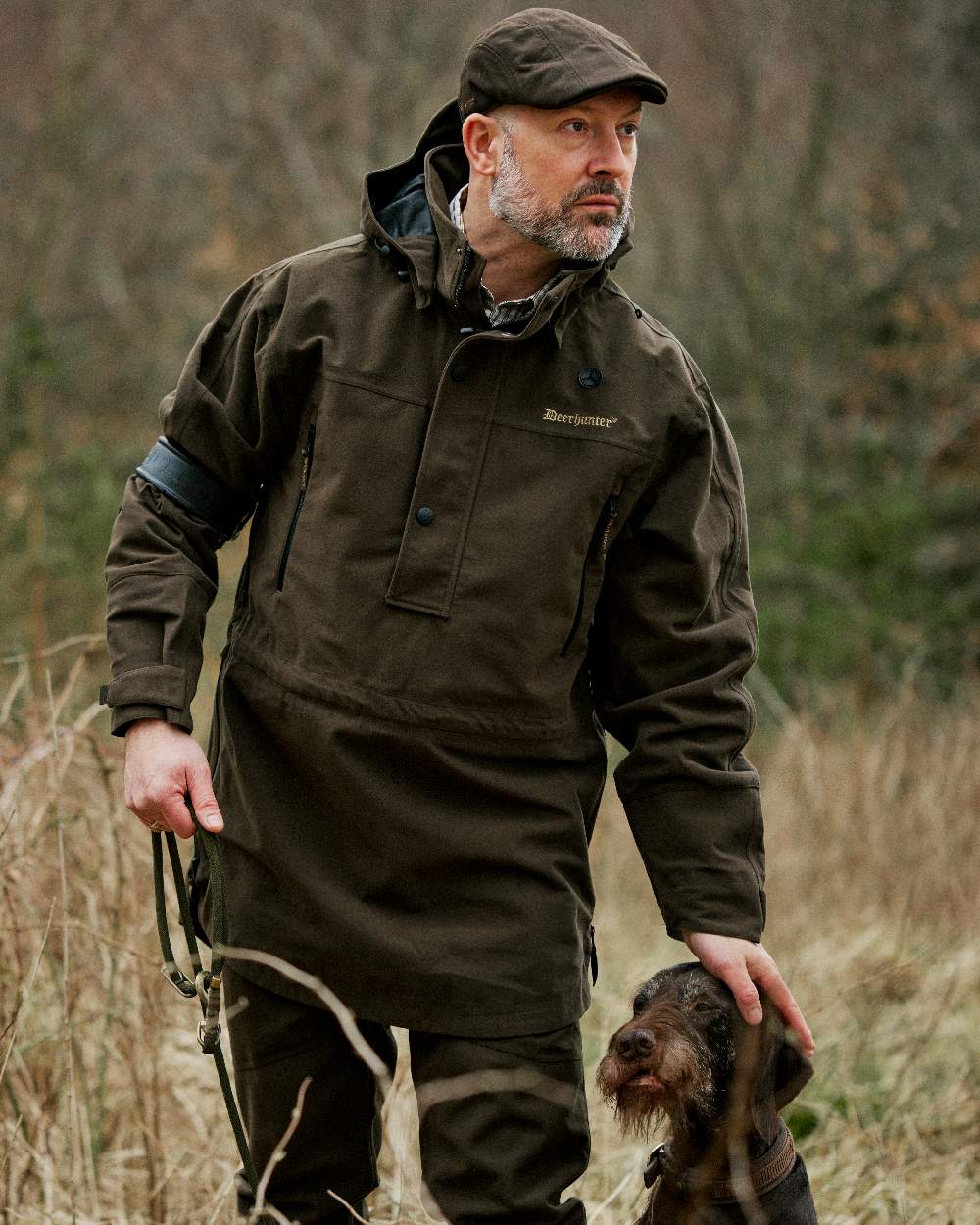Peat Coloured Deerhunter PRO Gamekeeper Smock on forest background #colour_peat