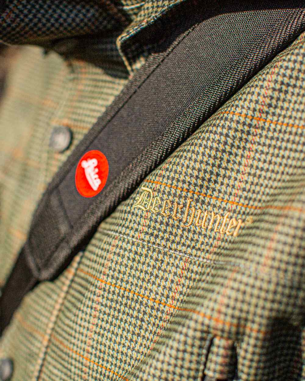 Turf Coloured Deerhunter PRO Gamekeeper Smock on blurry background #colour_turf