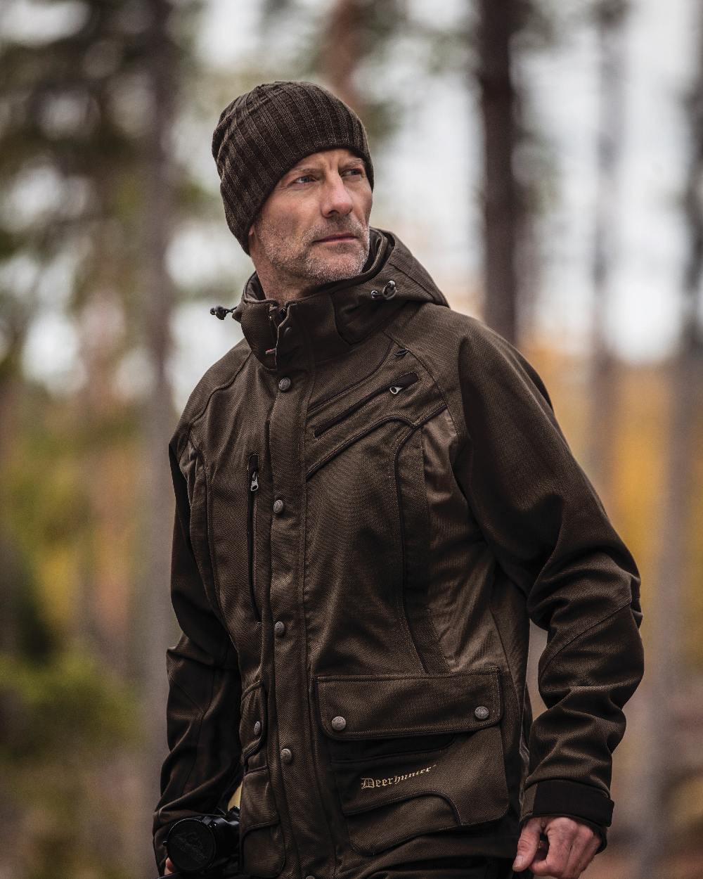 Beluga coloured Deerhunter Recon Knitted Beanie on forest background #colour_beluga