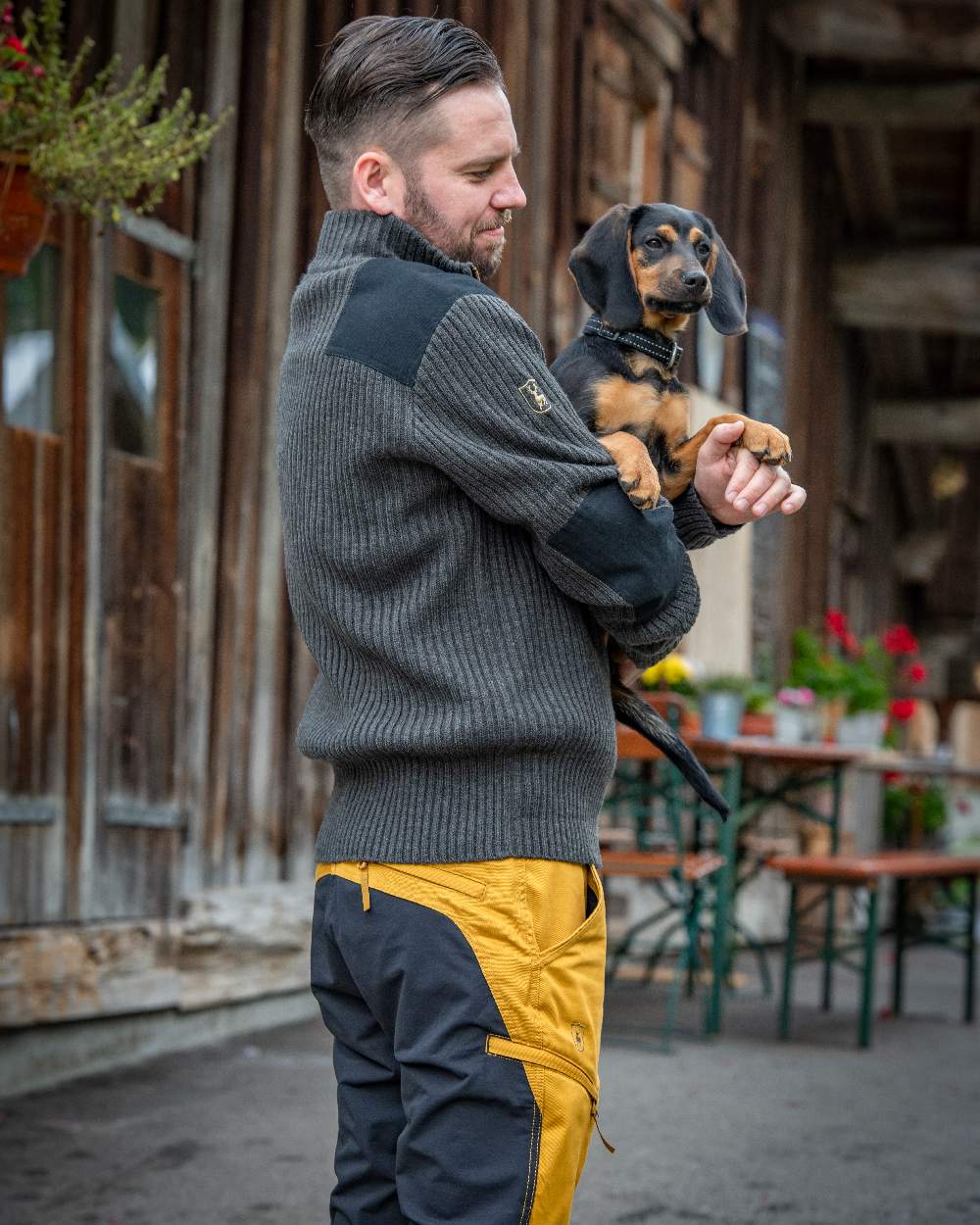 Buckthorn Coloured Deerhunter Rogaland Contrast Stretch Trousers on log house background #colour_buckthorn