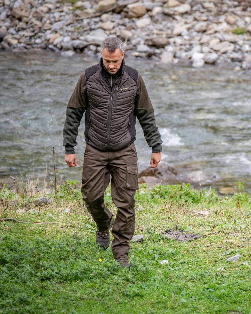 Fallen Leaf coloured Deerhunter Rogaland Trousers on lake background #colour_fallen-leaf