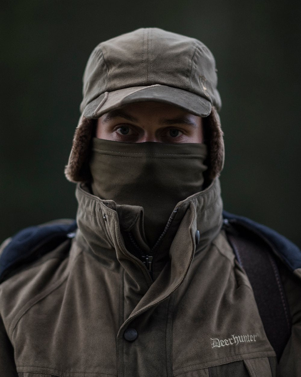 Peat coloured Deerhunter Rusky Silent Necktube on blurry background #colour_peat