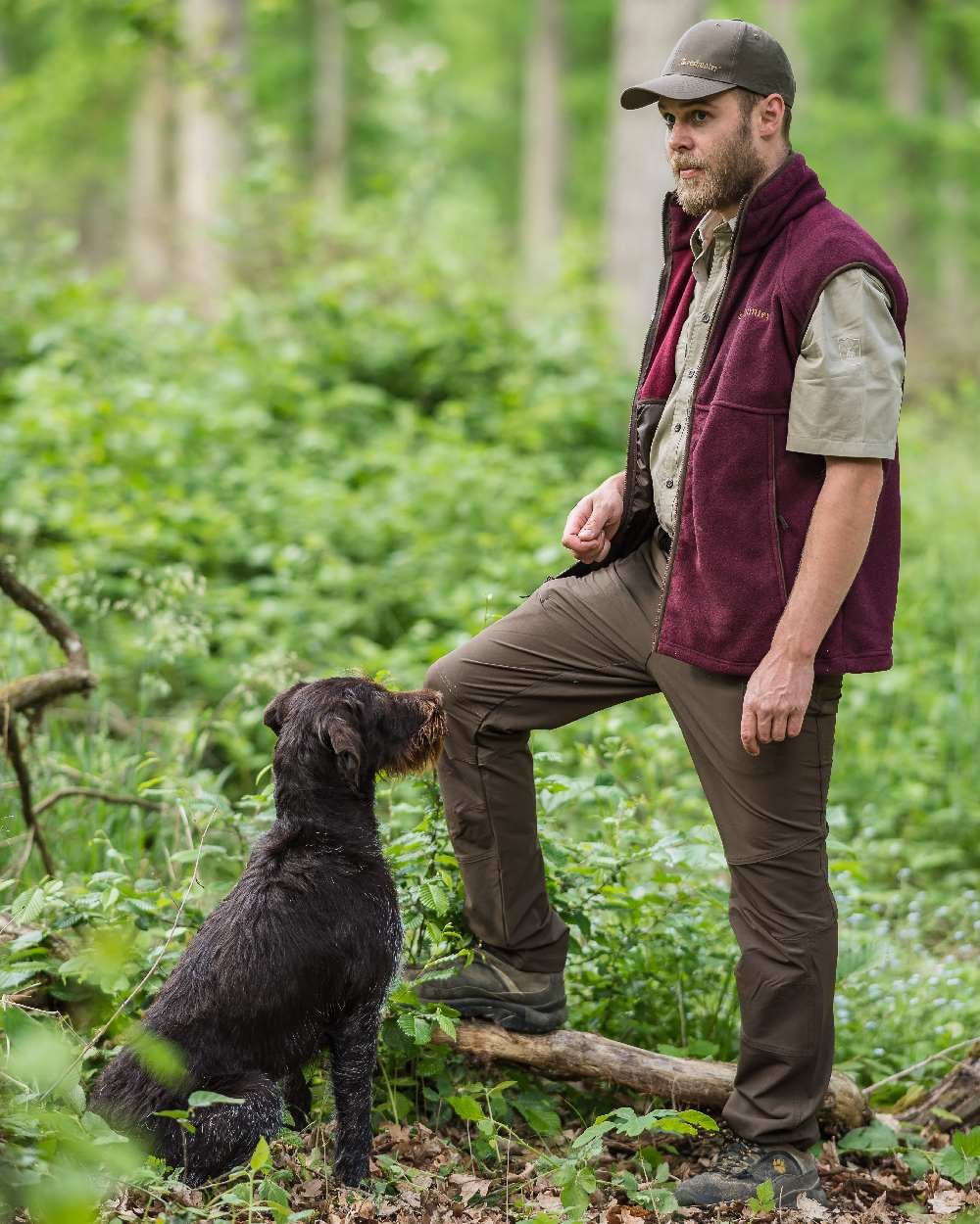 Fallen Leaf coloured Deerhunter Strike Full Stretch Trousers on forest background #colour_fallen-leaf