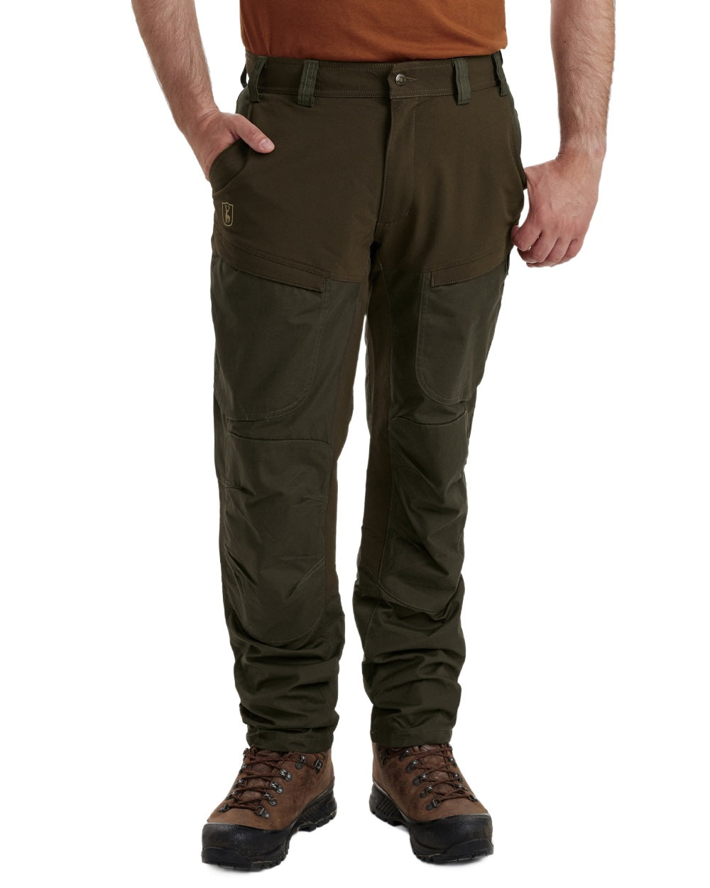 Deep Green coloured Deerhunter Strike Trousers With Membrane on forest background #colour_deep-green