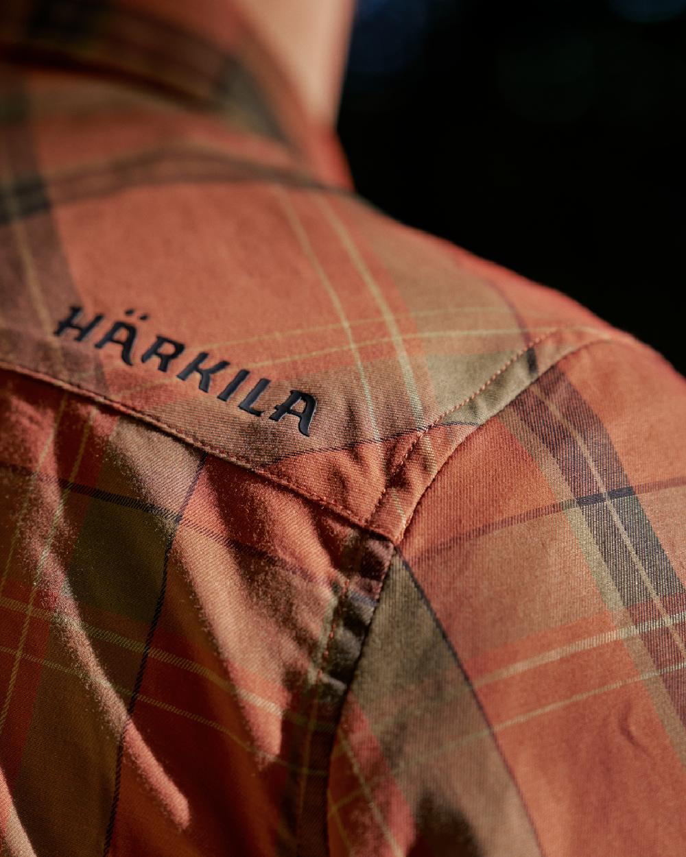 Arabian Spice Coloured Harkila Anker Long Sleeve Shirt on outdoor background #colour_arabian-spice