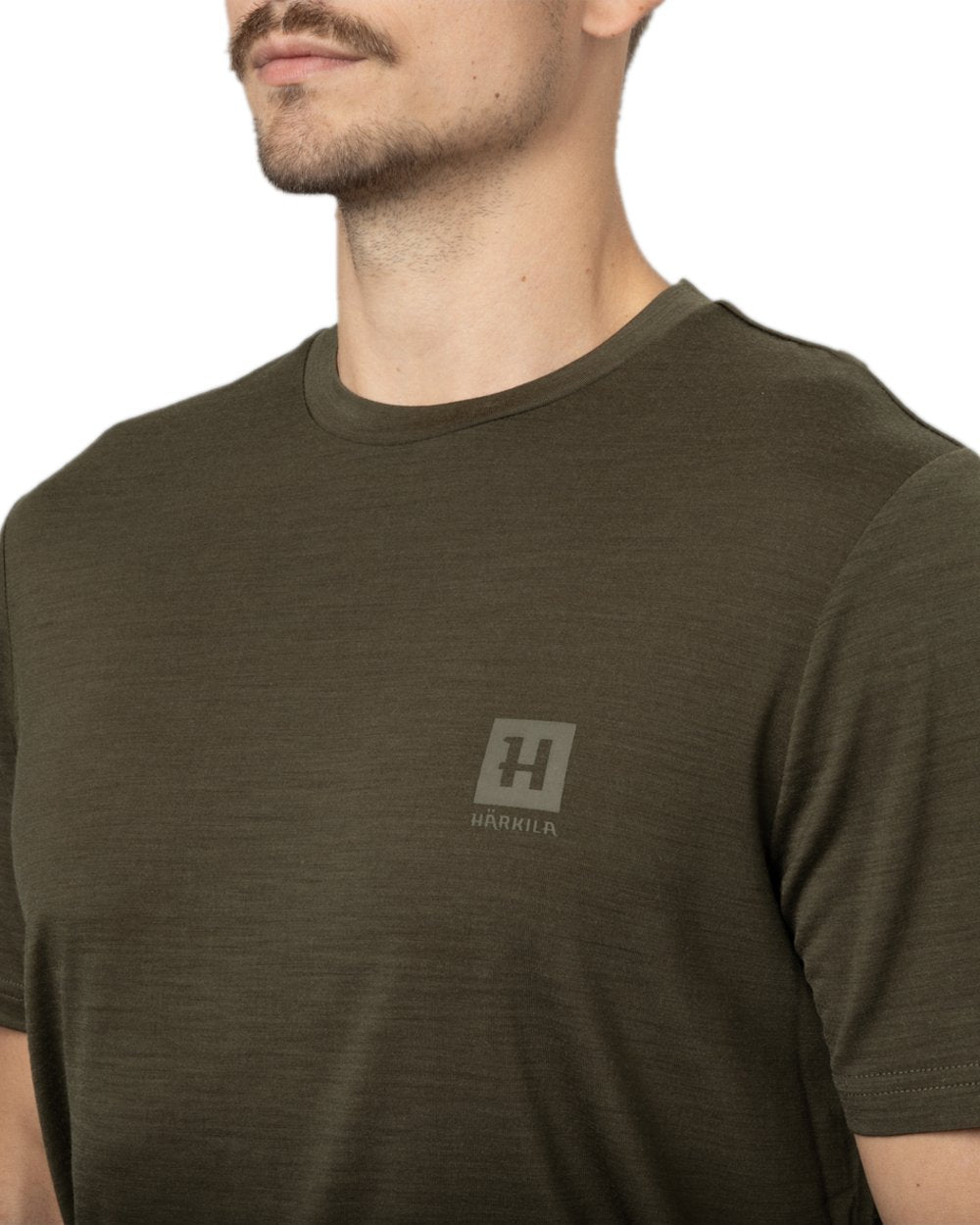 Willow Green Coloured Harkila Base All Season Short Sleeve T-Shirt on white background #colour_willow-green